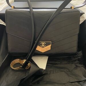 Chanel Black Leather Shoulder Bag with Gold Accents